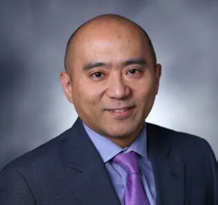 Dr. Max Tamae-Kakazu