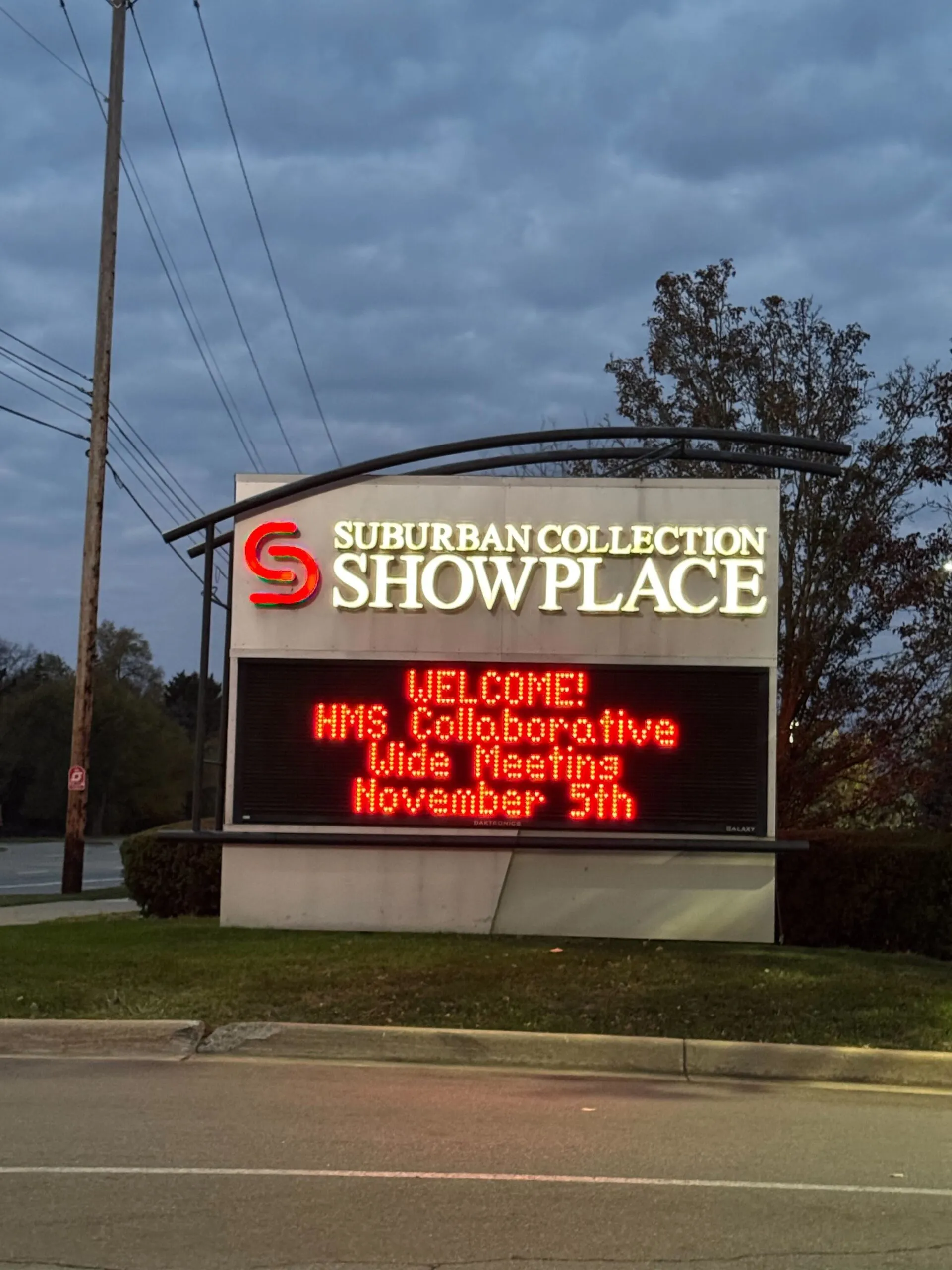 The signage at the venue showing the conference details