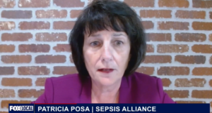 Patricia Posa of Sepsis Alliance speaking during a Fox Local news interview, seated in front of a brick wall background.